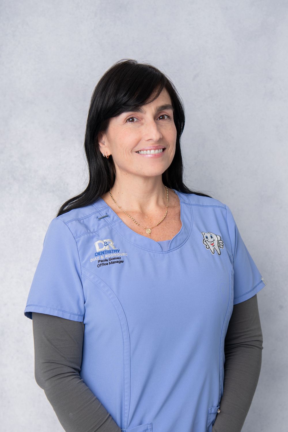 Paola Gomez at D & R Dentistry